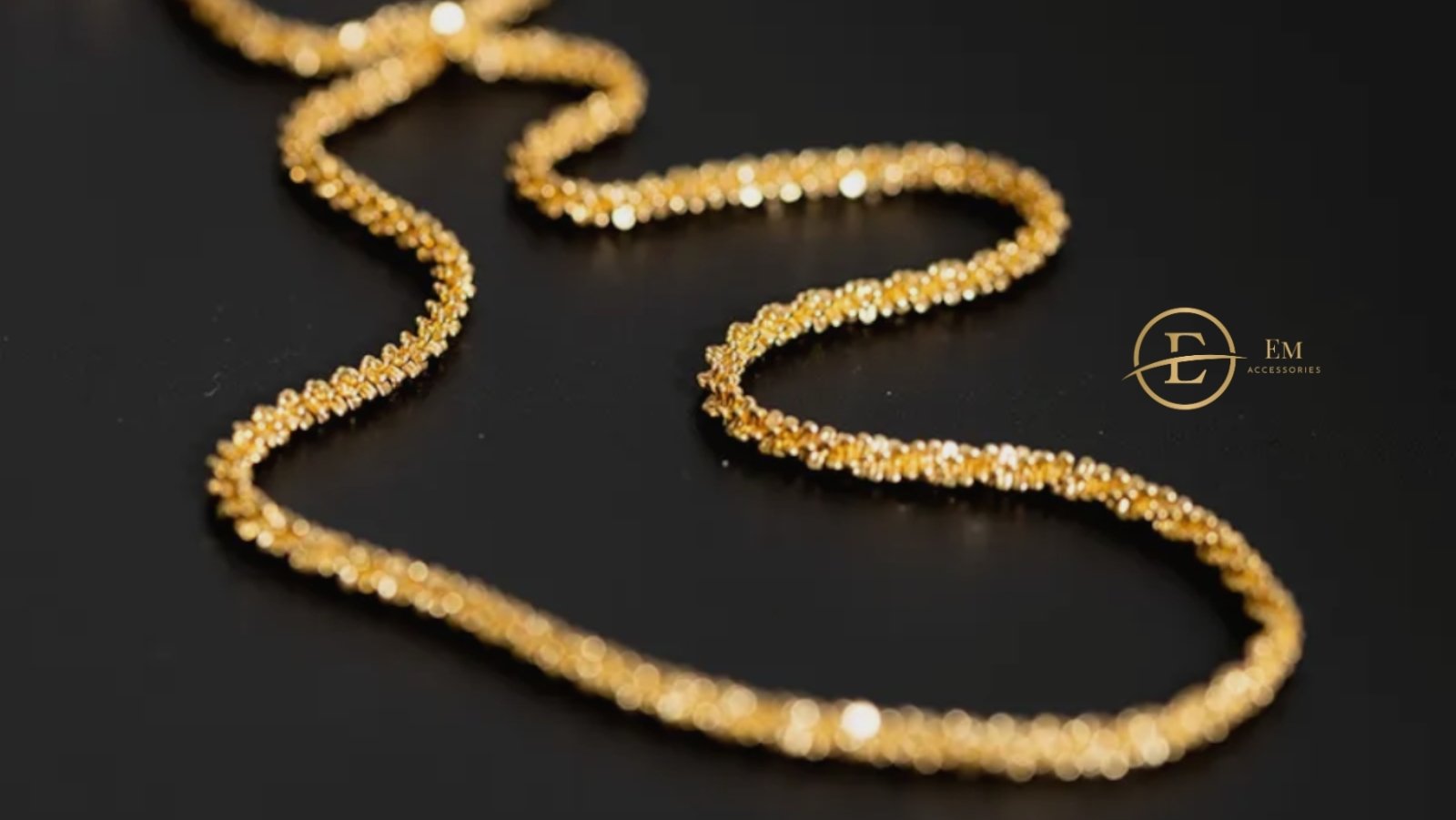 a close up of a gold women's necklace chain